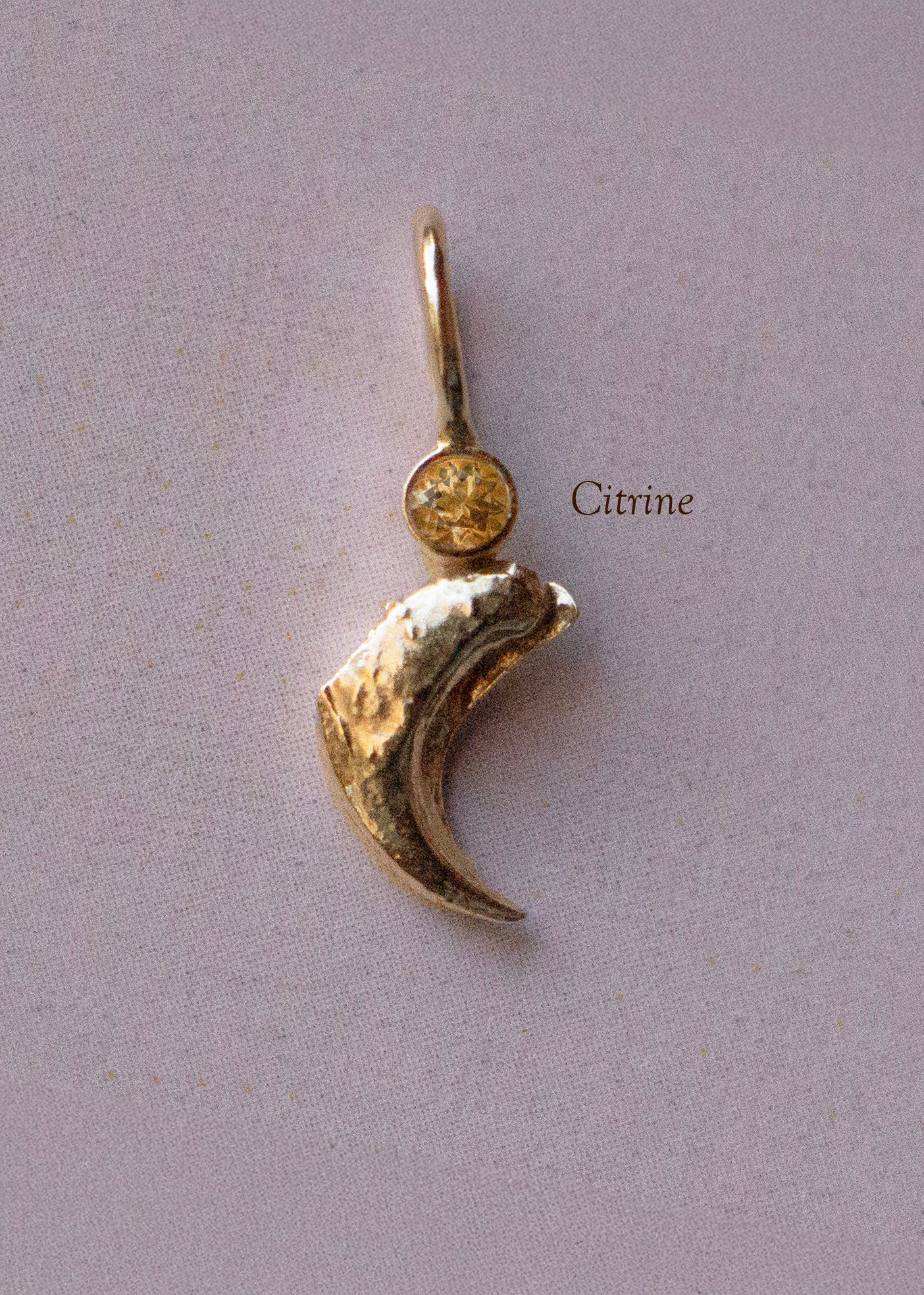 GEMSTONE CLAW PENDANT