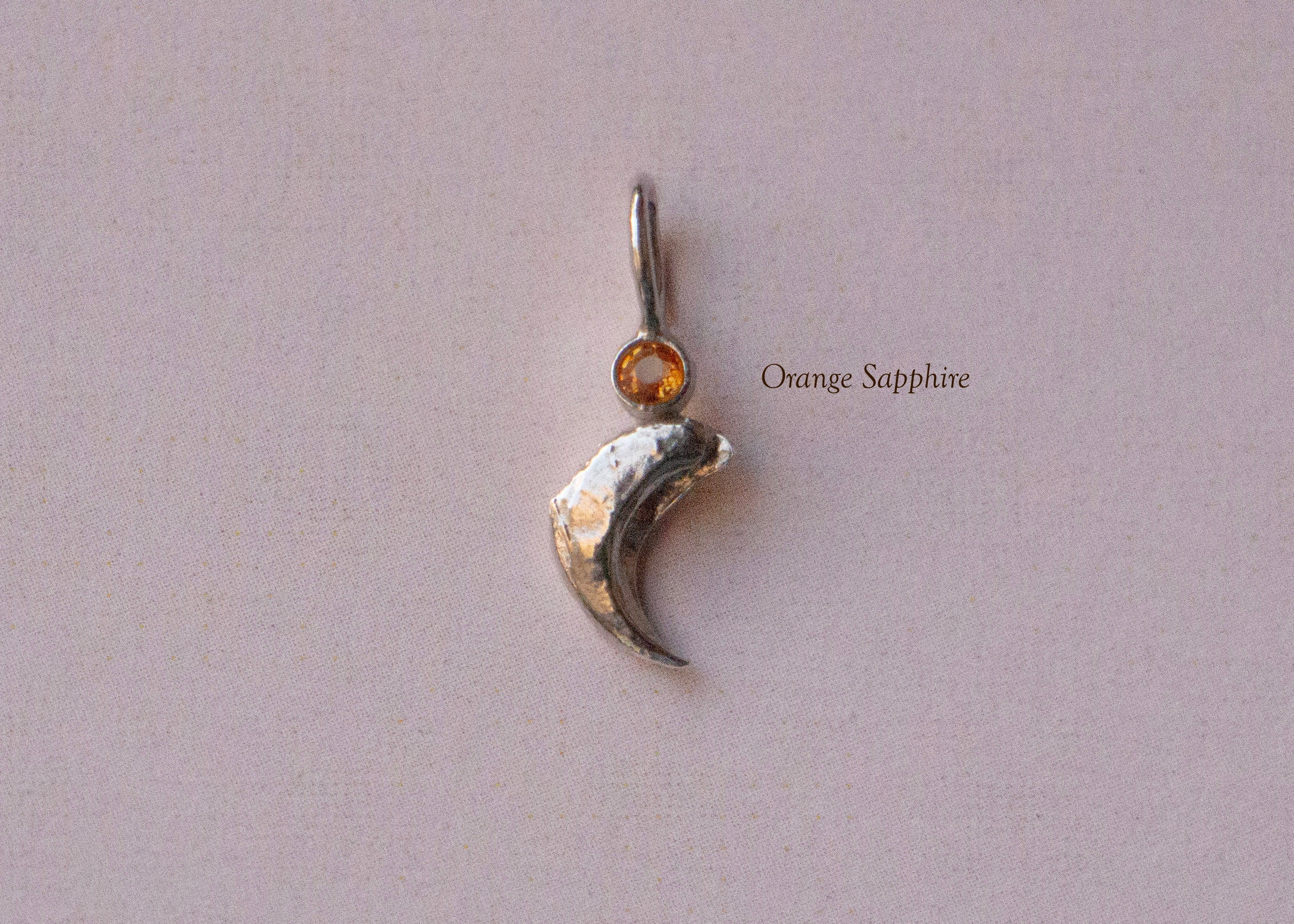GEMSTONE CLAW PENDANT