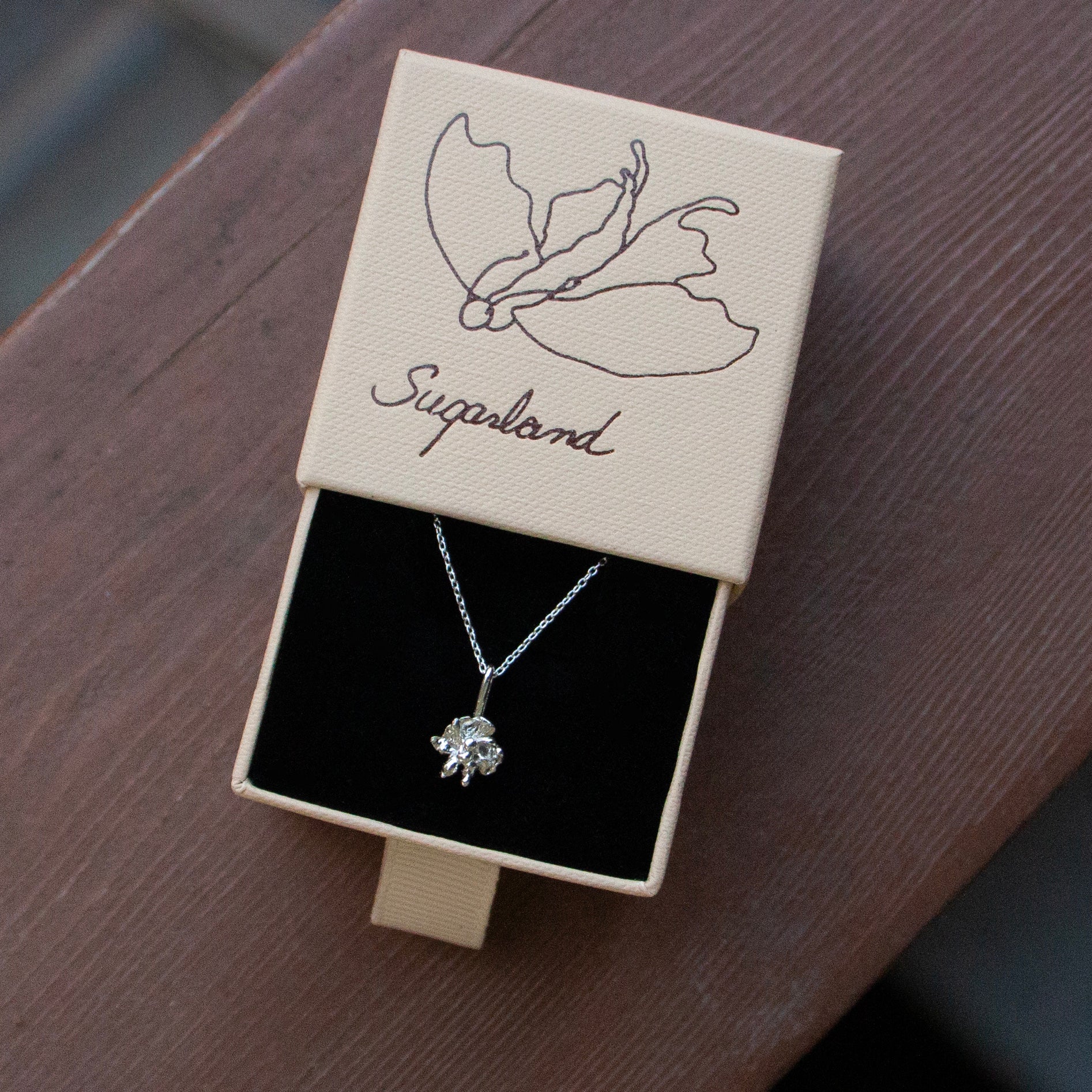 RUFFLED ORCHID PENDANT