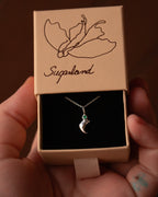 GEMSTONE CLAW PENDANT